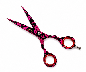 A pair of professional hair shears with black and vibrant pink floral patterned handles and blades, featuring a silver metal pivot screw and a silver thumb button, shown on a plain white background.
