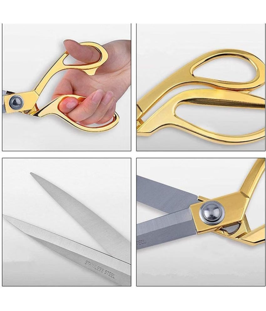 Gold scissors with close-up details on a white background