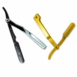 Two straight razors, one black and silver, the other gold, on a white background.